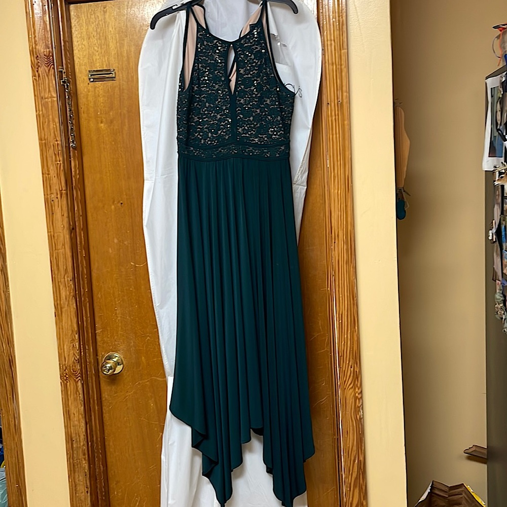 Size 12 mother of the groom dress. Jade/Hunter green with sequins on the top.